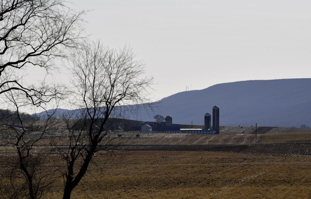 A cell phone and a 911 tower can be seen in the distance on Centre Hall Mountain over the farmland of Madisonburg.