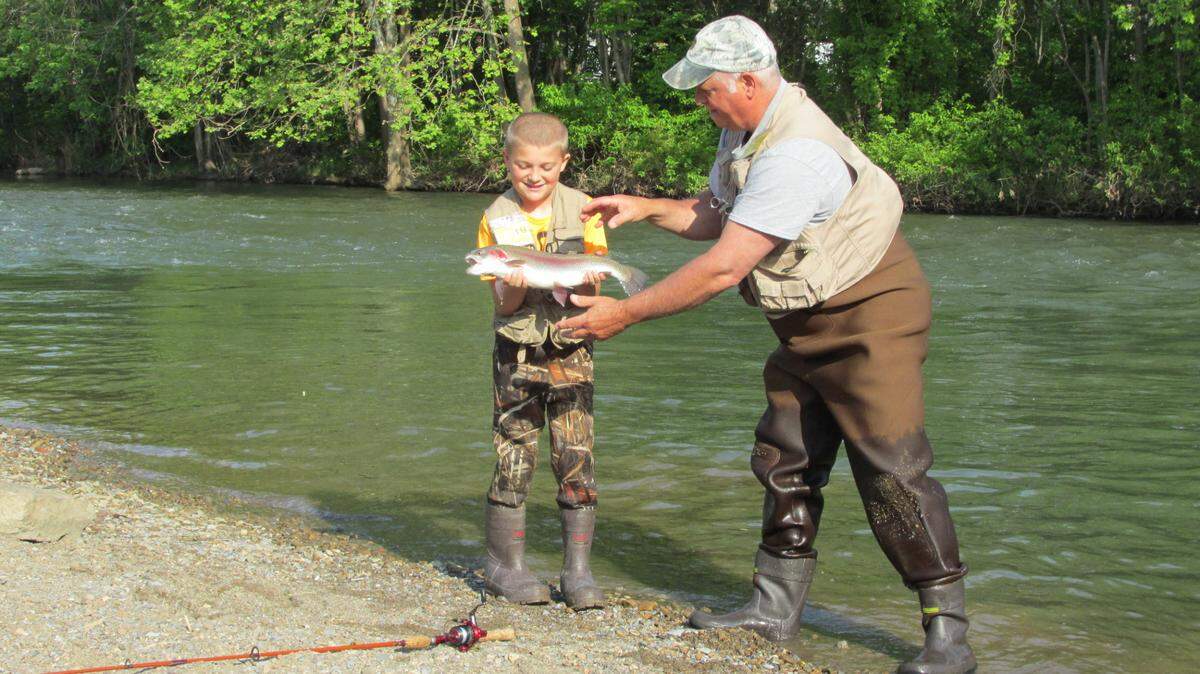 Jeramiah Shaffer of Bellefonte with a large rainbow trout that he caught on section 6 of Bald Eagle Creek. Under the new proposal, only rainbow trout will be allowed to be harvested.