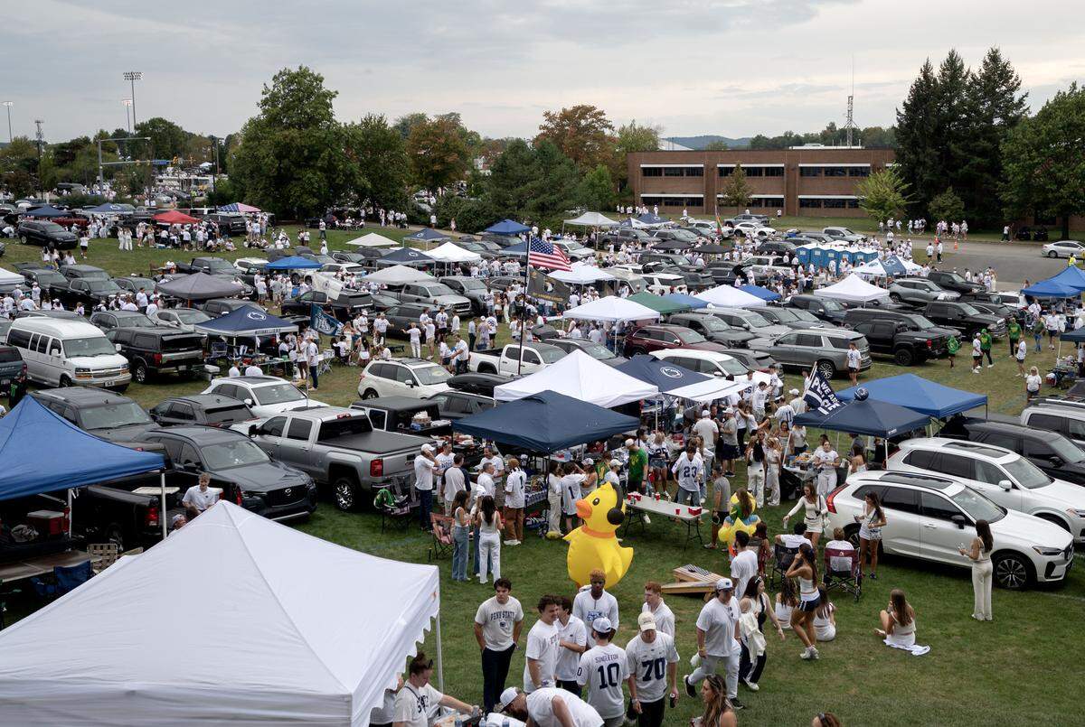 Fans tailgate before the Penn State football game against Oregon on Saturday, Sept. 27, 2025.  