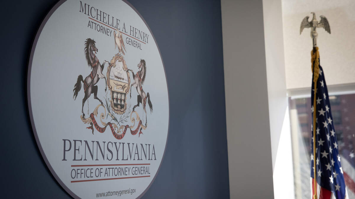 A sign for the Pennsylvania Office of Attorney General.
