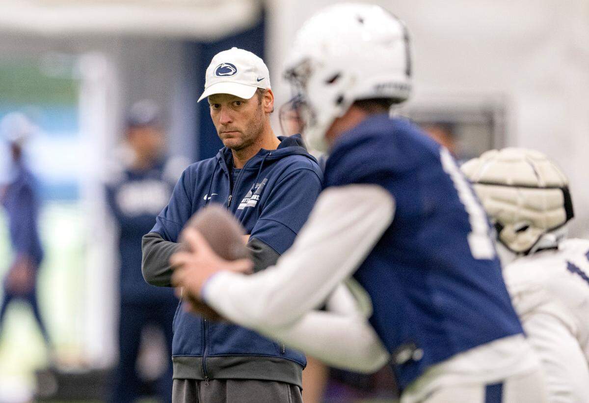 Penn State offensive coordinator Mike Yurcich watches quarterback Drew Allar run drill during practice on Wednesday, Oct. 19, 2022.