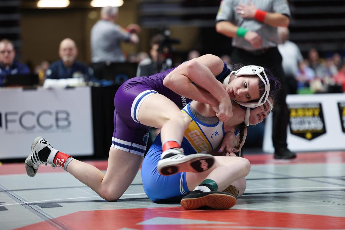 Philipsburg-Osceola’s Isabella DuVall controls Greenville’s Kelly Enterline in their 124-pound PIAA girls first round match on Thursday, March 7, 2024 at the Giant Center in Hershey.