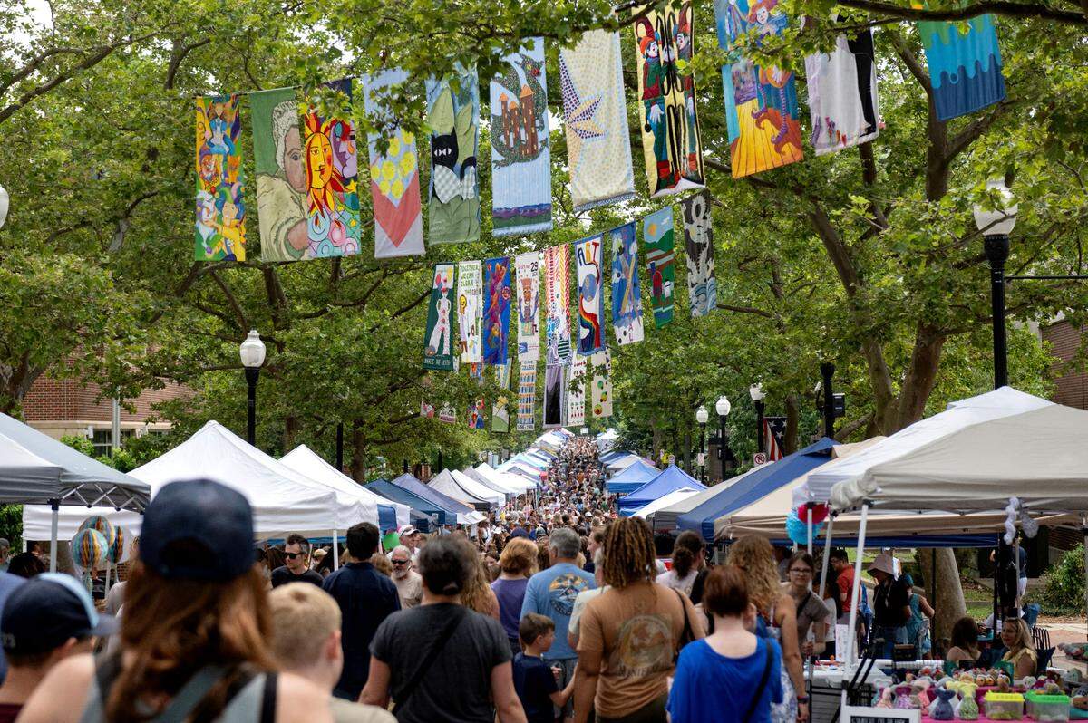 People fill Allen Street for the Central Pennsylvania Festival of the Arts Children and Youth sidewalk sale on Wednesday, July 9, 2025.
