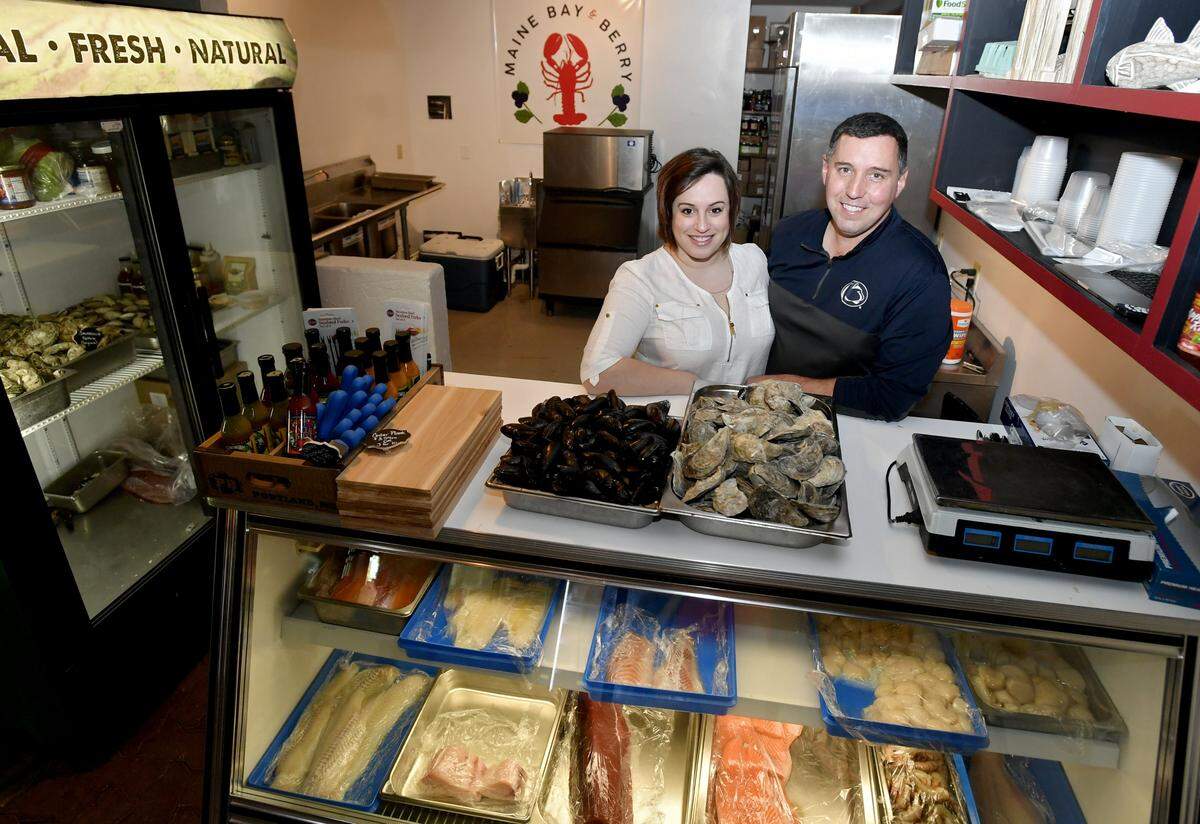 Christa Stofferahn and Shaun Knight of Maine Bay & Berry in The Barn at Lemont on Wednesday, May 9, 2018.  They offer fresh seafood and artisan products from Maine. With The Barn at Lemont moving, Maine Bay & Berry will be expanding its operation.