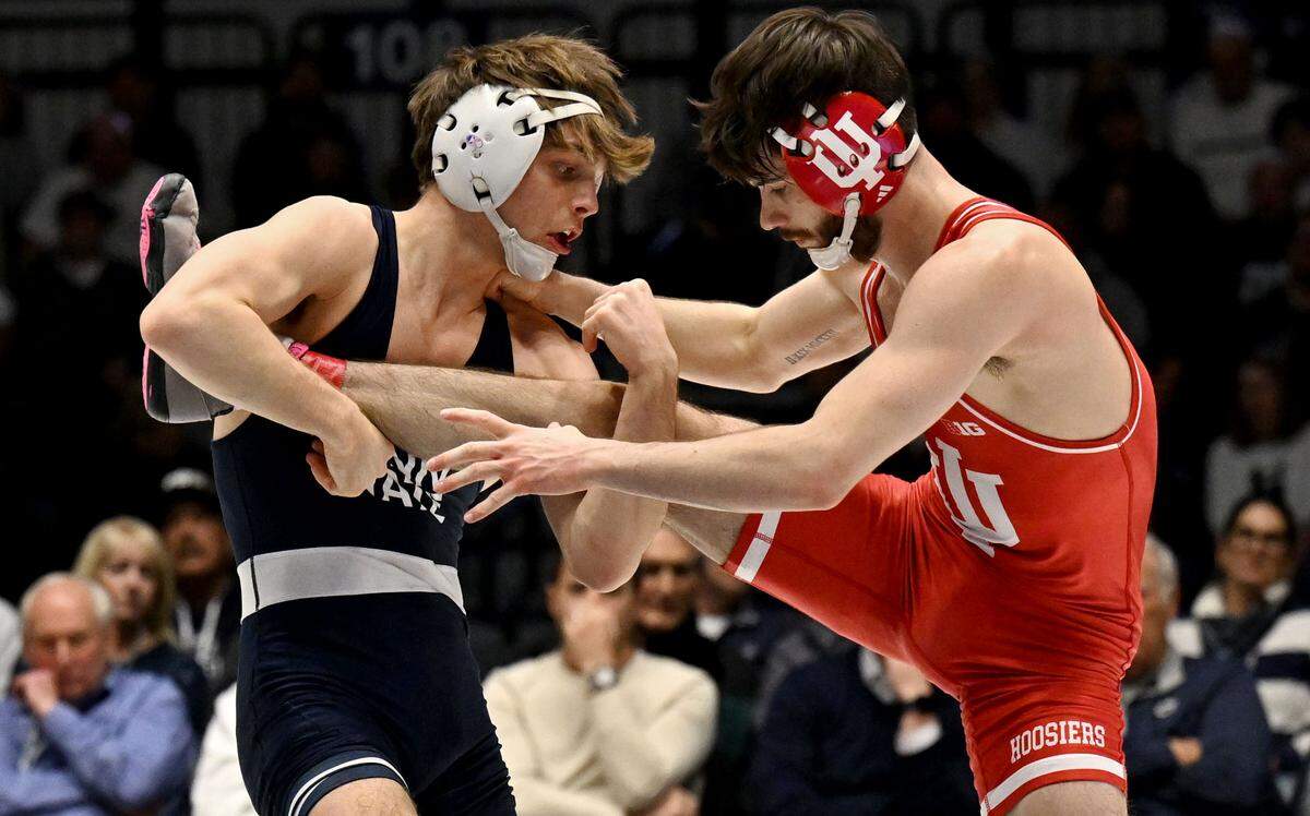 Penn State’s Marcus Blaze trips up Indiana’s Blaine Frazier in the 133 lb bout of the match on Friday, Jan. 23, 2026.