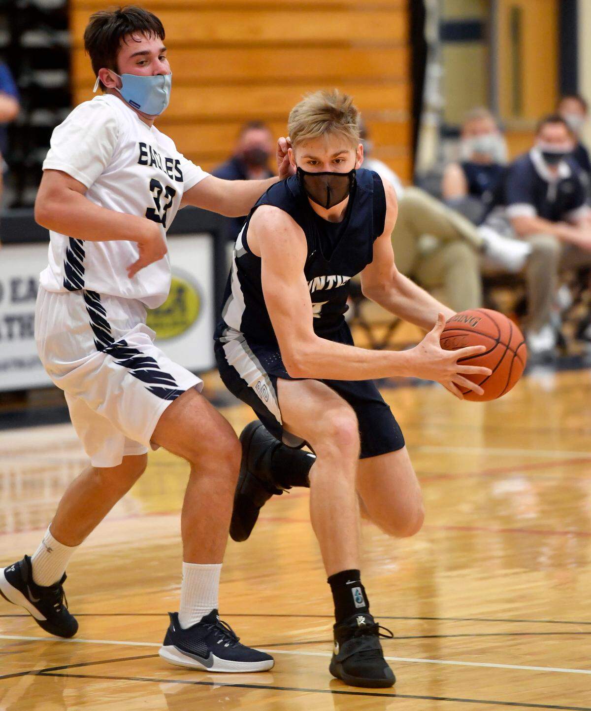 Philipsburg-OsceolaÕs Ryan Whitehead dribbles around Bald Eagle AreaÕs Ayden Jodon during the game on Friday, Jan. 22, 2021.