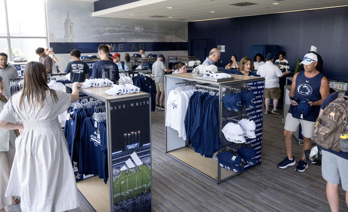 Shoppers browse the new adidas Penn State gear during a pop-up sale on Wednesday, July 1, 2026 at Pegula Ice Arena.