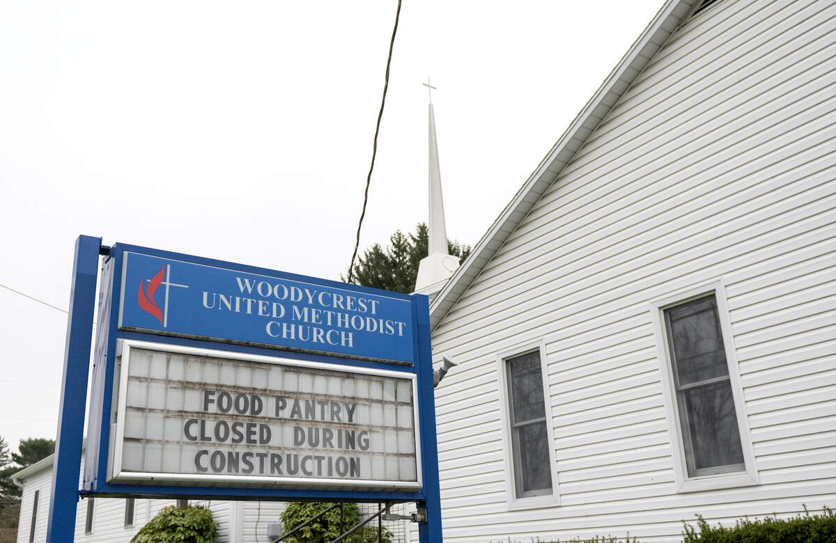 The old steeple has been placed on the new sanctuary of Woodycrest United Methodist Church on Thursday, April 2, 2026. The church was destroyed by a fire in 2024 but the steeple was saved.