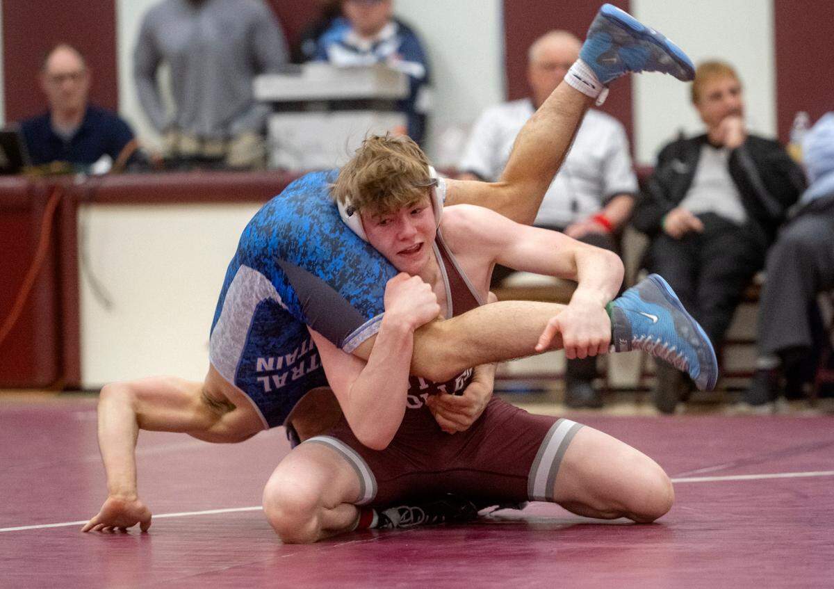 State College’s Asher Cunningham controls Central Mountain’s Griffin Walizer non the 145 lb championship bout of the District 6 3A championships on Saturday, Feb. 18, 2023.