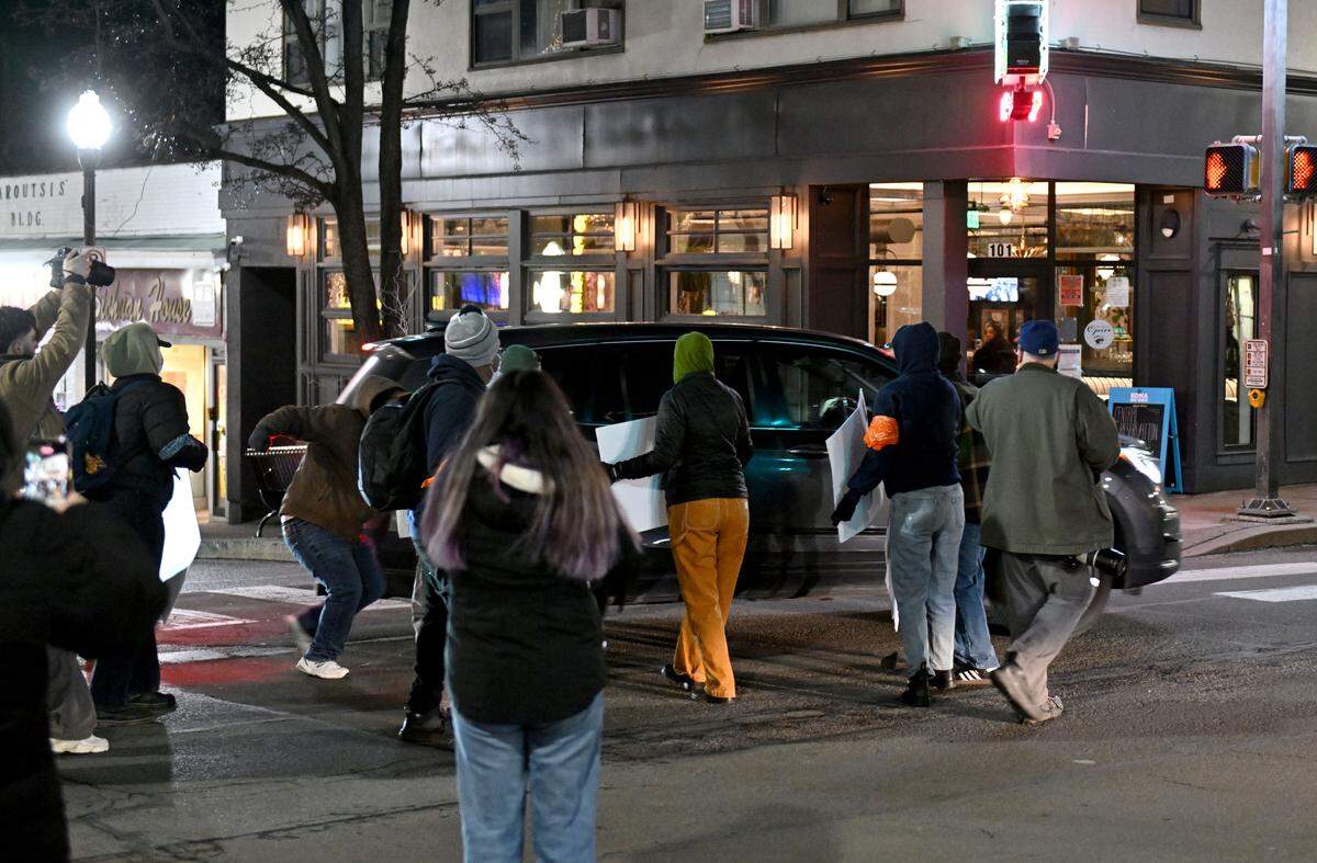 Anti-ICE protesters block traffic on Monday, Jan. 12, 2026.  