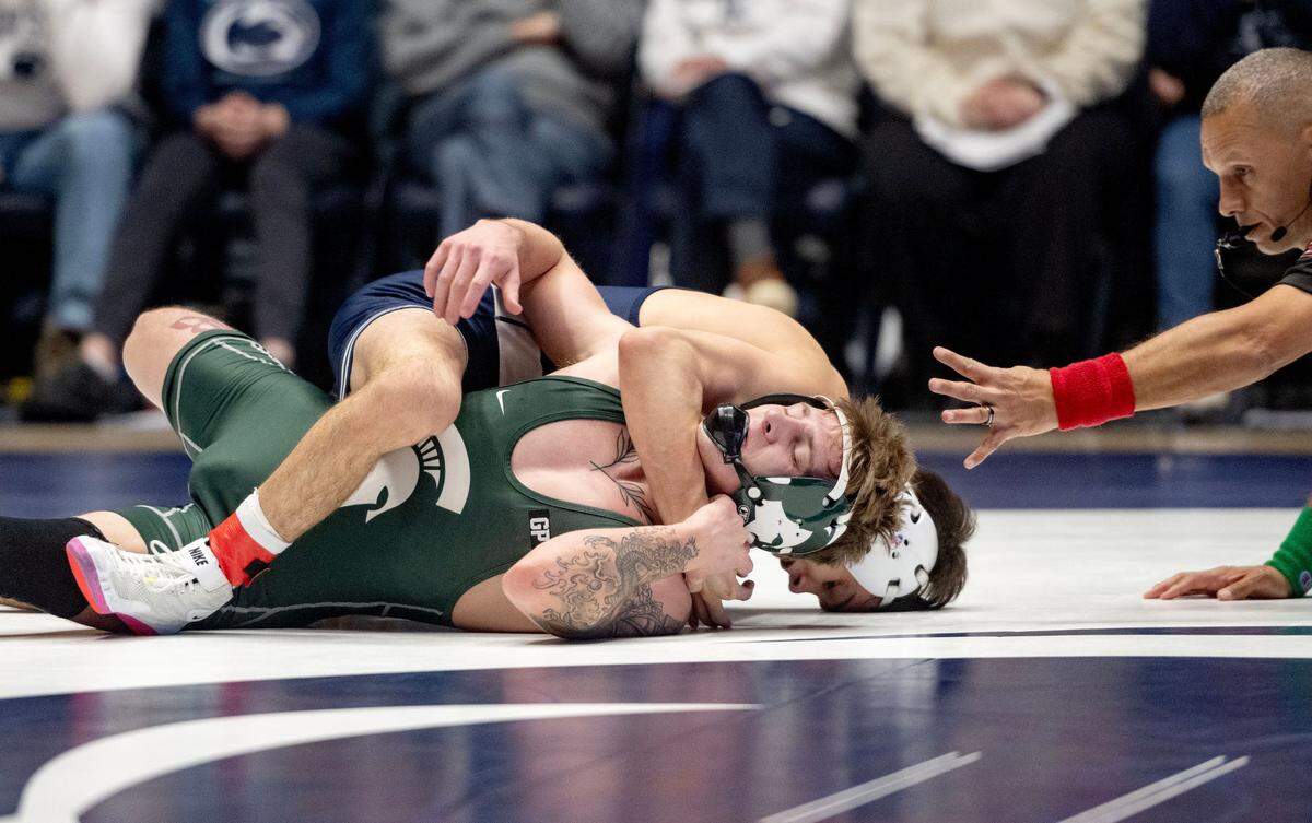 Penn State’s Luke Lilledahl controls Michigan State’s Nick Corday in the 125 lb bout of the match on Friday, Jan. 10, 2025 in Rec Hall. Lilledahl won by tech fall.