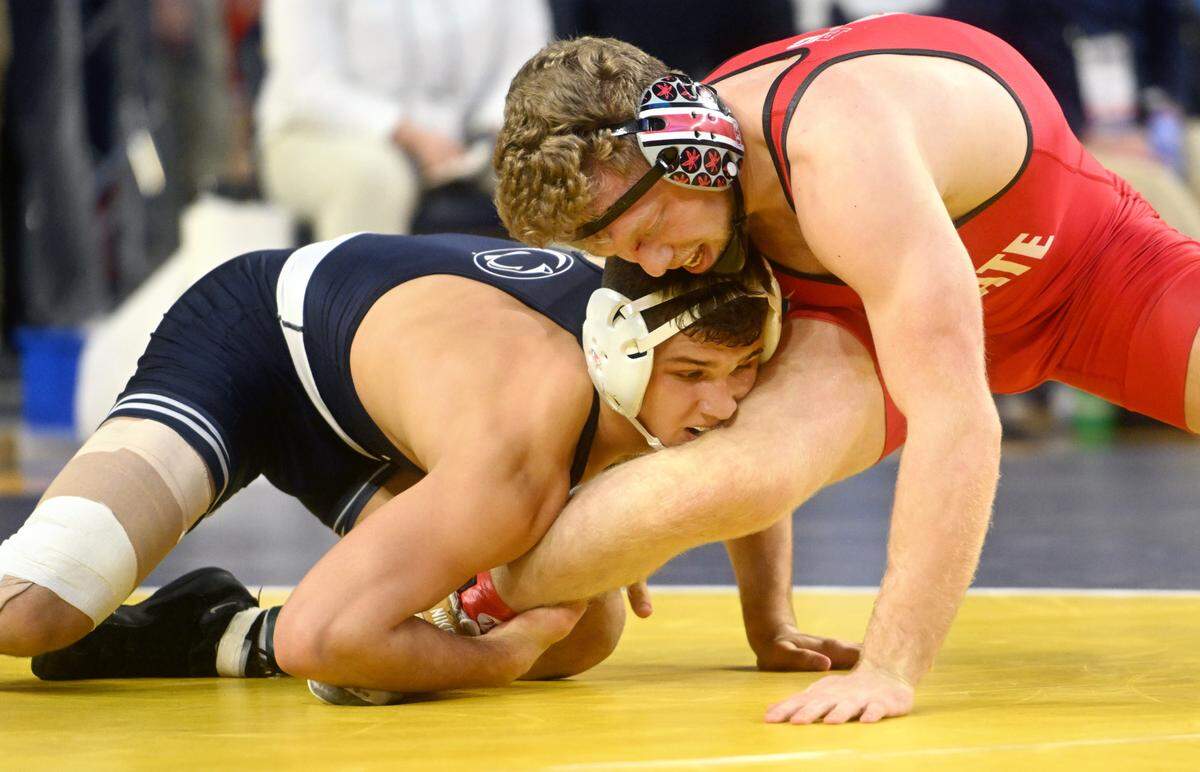Penn State’s Alex Facundo holds onto Ohio State’s Carson Kharchla in a 165 lb quarterfinal bout of the Big Ten wrestling championships at the Crisler Arena in Ann Arbor Michigan on Saturday, March 4, 2023.