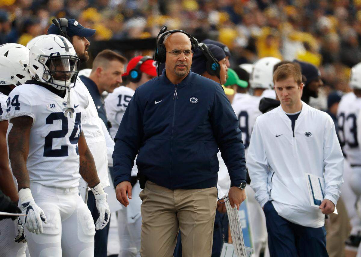 Penn State head coach James Franklin looks on with Miles Sanders by his side. Sanders managed 14 rushing yards on seven carries.