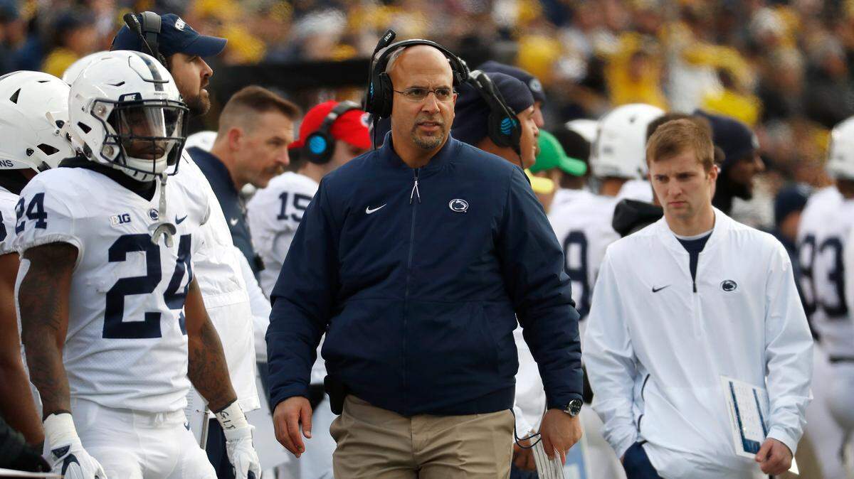 Penn State head coach James Franklin looks on with Miles Sanders by his side. Sanders managed 14 rushing yards on seven carries.