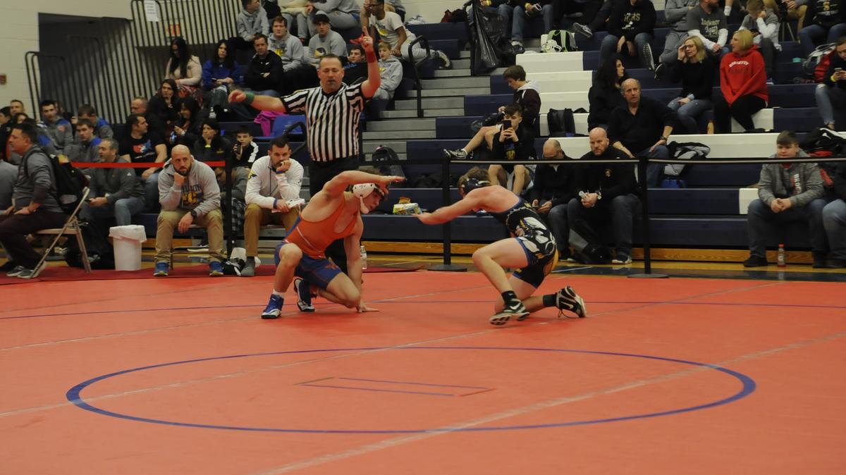 St. Joseph’s Catholic Academy’s Zack Witmer looks for an opening on Wilson’s Dustin Hunara during their 132-pound quarterfinals match of the Ultimate Warrior Tournament at West Branch High School in Allport on Friday, January 25, 2019. Witmer pinned Hunara in 3:29.