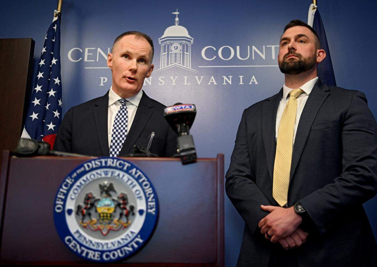 Centre County First Assistant District Attorney Sean McGraw announces on Tuesday, April 18, 2023, the suspect for a July 2000 rape of a 19-year-old Penn State student jogging along the Penn State golf course. Next to McGraw is Penn State University police detective and lead investigator Nicholas Sproveri.