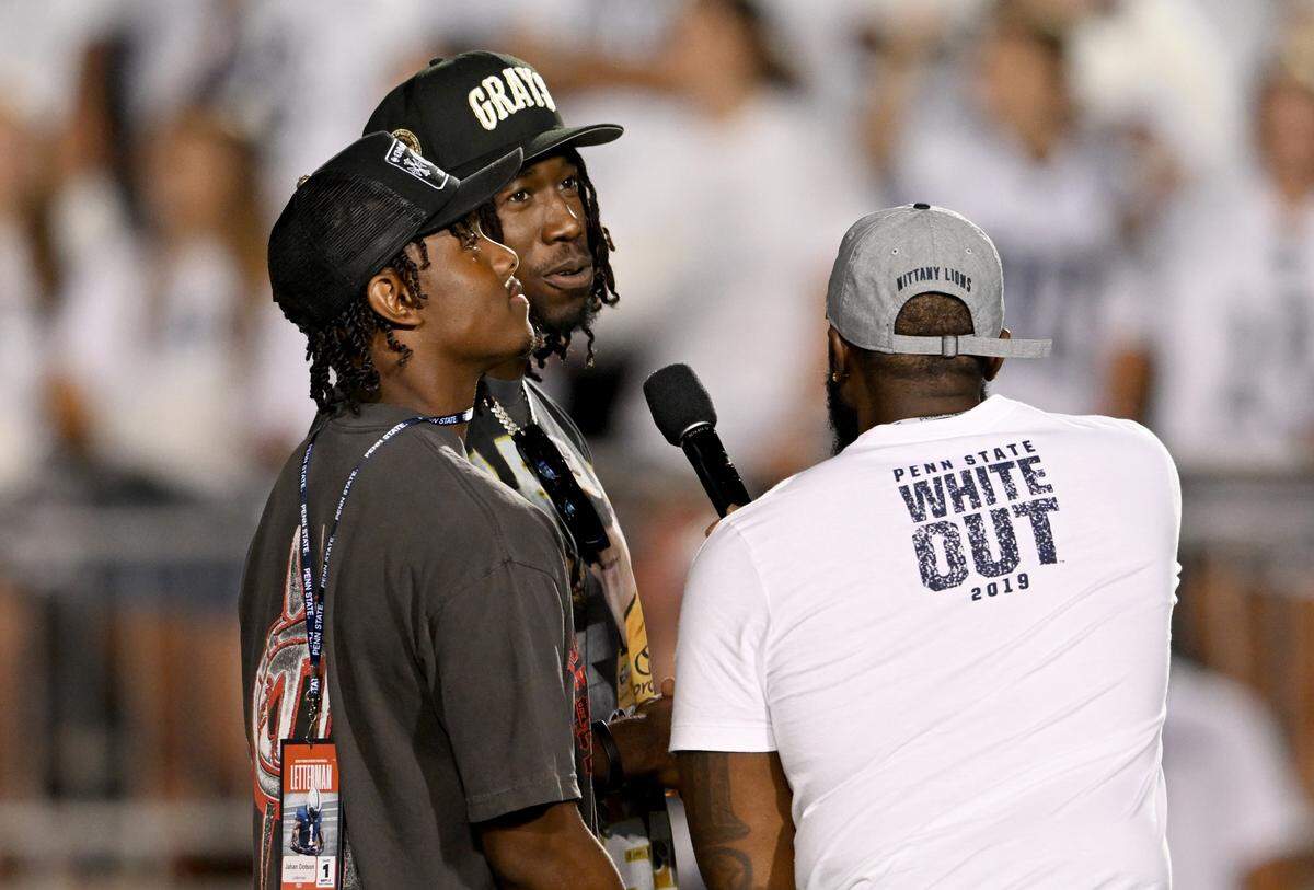 Former Penn State players Jahan Dotson and Joey Porter Jr. lead a “We Are” chant during the game against West Virginia on Saturday, Sept. 2, 2023.