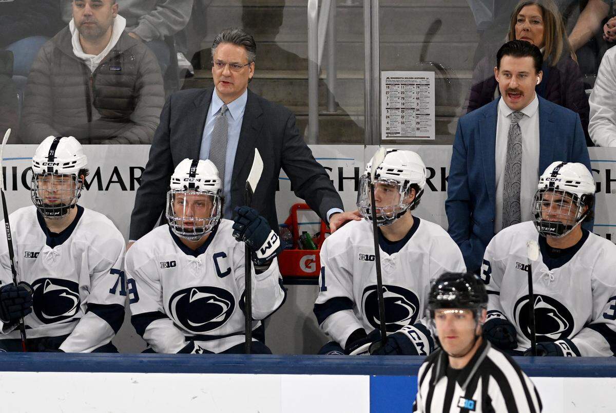 Penn State men's hockey coach Guy Gadowsky talks to Luke Misa during the game against Minnesota on Friday, Jan. 9, 2026 at Pegula Ice Arena. 