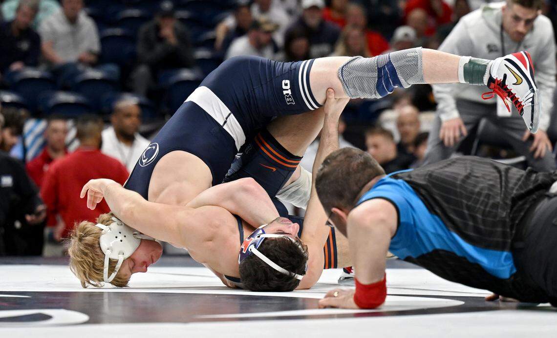 Penn State's Braeden Davis pins Illinois’ Danny Pucino in a 141-pound bout during the Big Ten Championships on Saturday, March 7, 2026 at the Bryce Jordan Center.