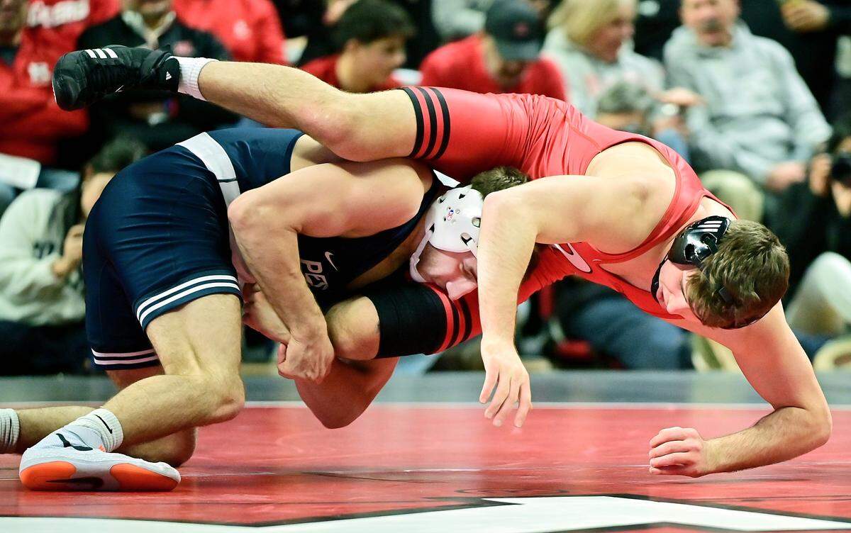 Penn State’s Mitchell Mesenbrink finishes off a takedown of Rutgers’ Anthony White during their 165-pound bout of the Nittany Lions’ 35-3 win on Friday in Piscataway, NJ. Mesenbrink beat White, 19-3.
