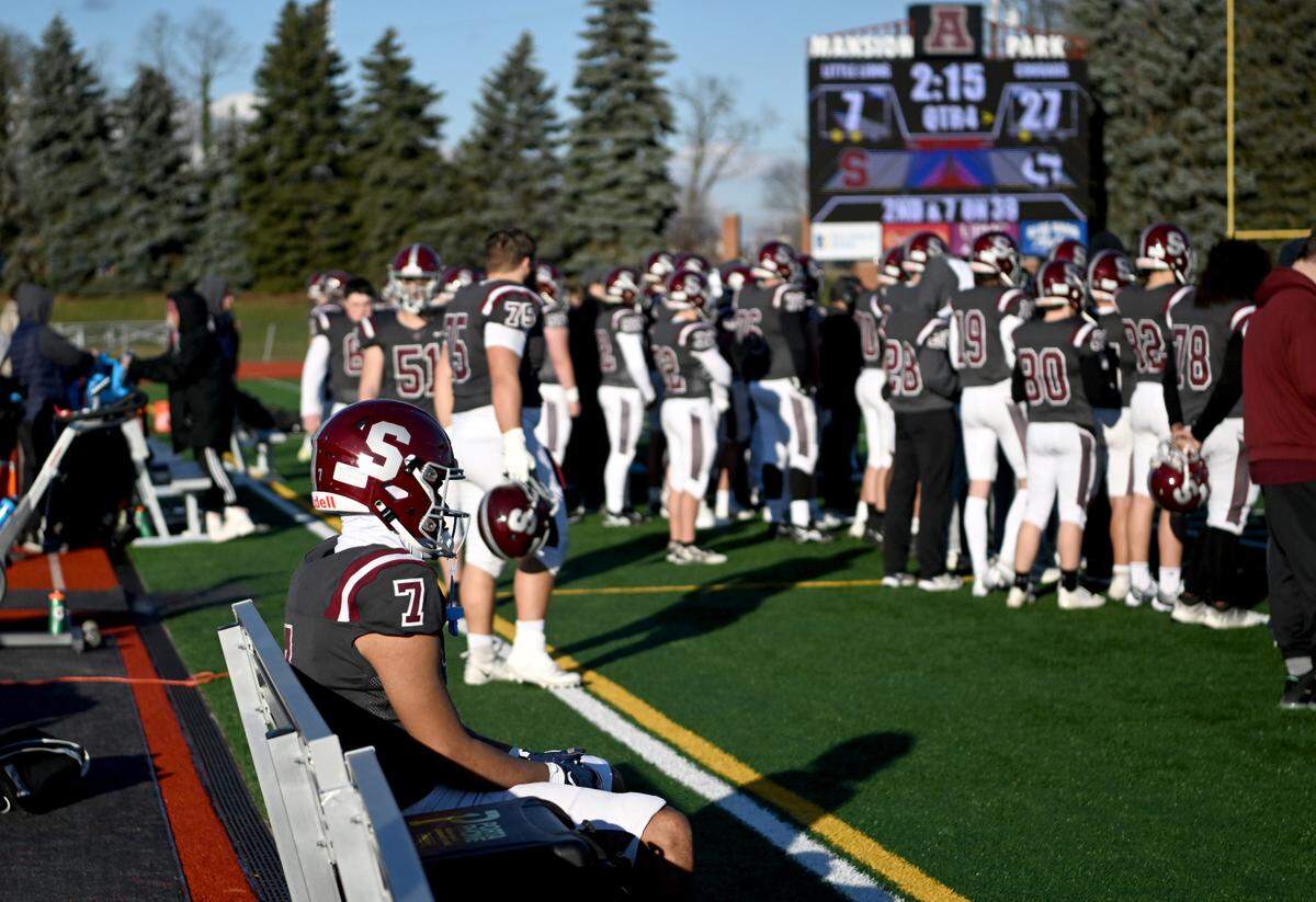 State College’s D’Antae Sheffy sits in disappointment as Harrisburg leads the PIAA 6A semifinal game in the fourth quarter at Mansion Park on Saturday, Dec. 3, 2022.