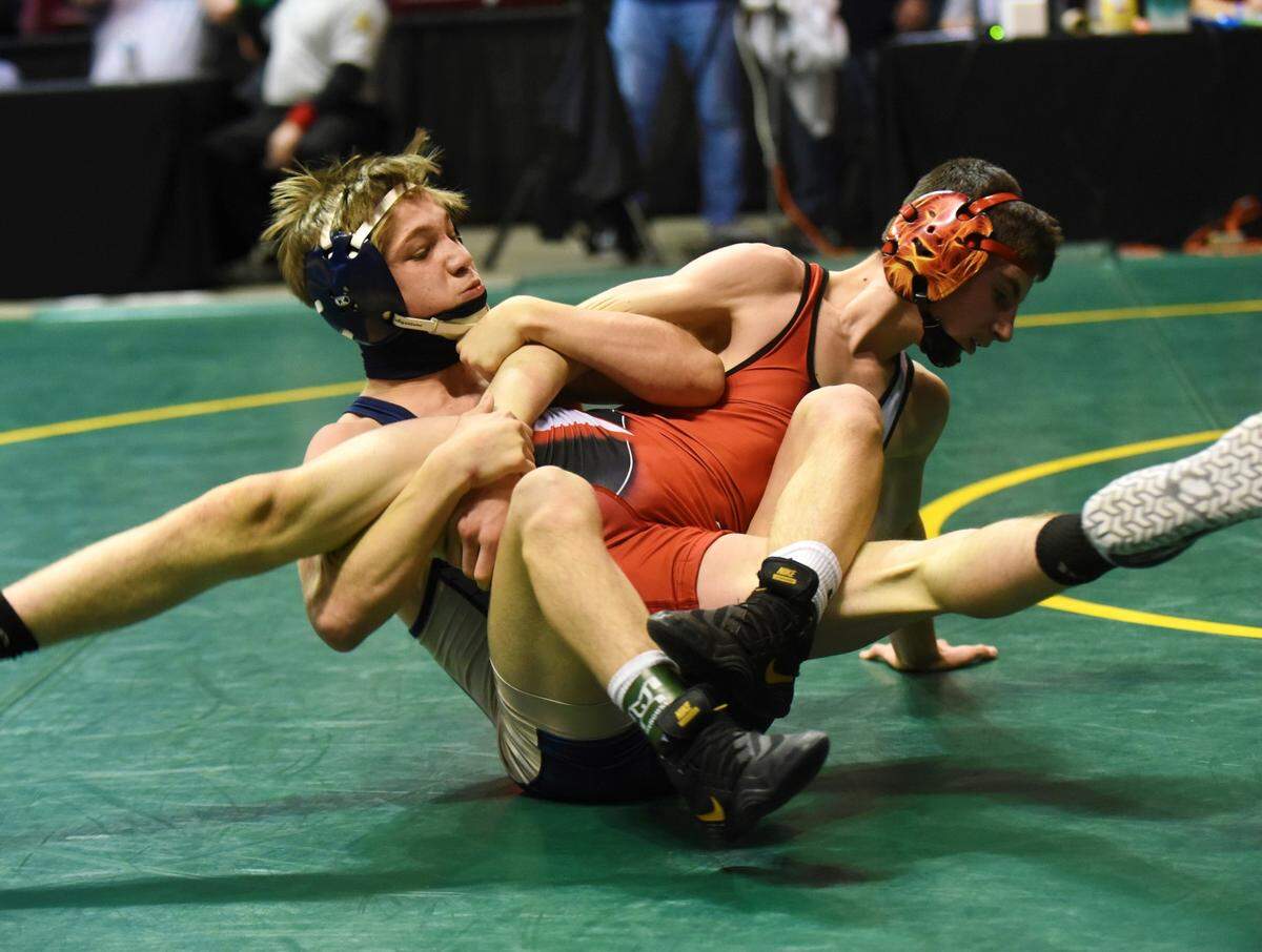 Bald Eagle Area’s Coen Bainey looks for near-fall points on Elizabeth Forward’s Damon Michael’s in their 113-pound consolation finals match during the PIAA Class 2A Southwest Regional tournament on Saturday at Indiana University of Pennsylvania. Bainey topped Michaels 7-5 to finish third.