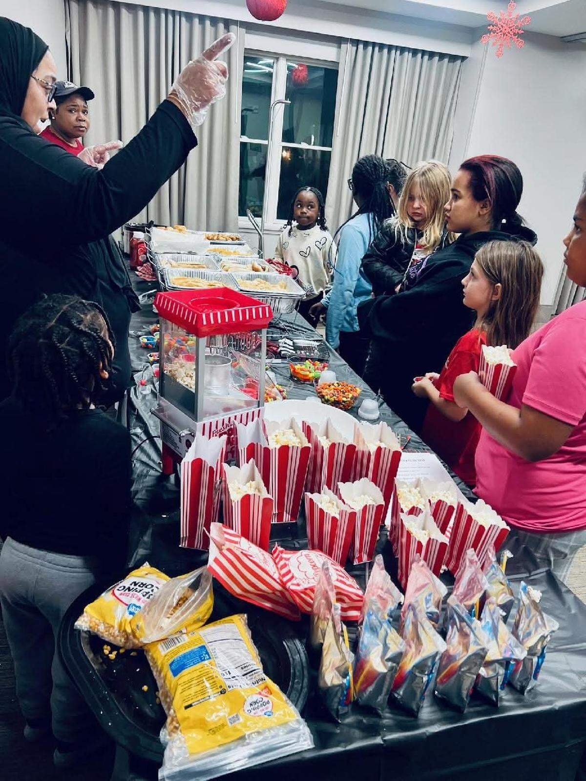 Under Angel Wings holds various community events including movie nights.