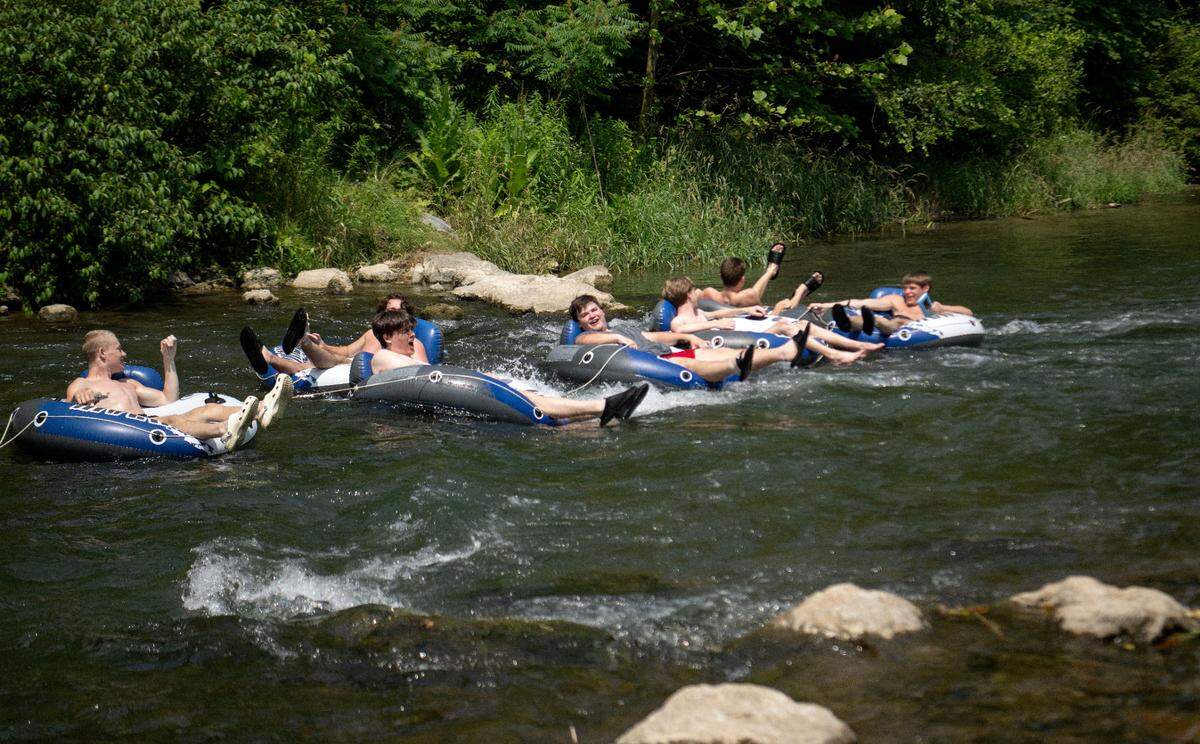 A group of friends from State College float down Spring Creek towards Milesburg on Friday, June 21, 2024.