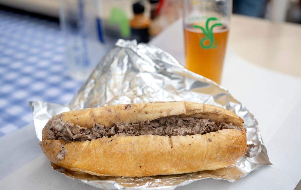 A cheesesteak from Uncle John’s Jawns outside of Angtifragile Brewing Co. on Friday, Sept. 22, 2023. A half pound of dry-aged beef is used along with a fresh roll from Gemilli Bakers.