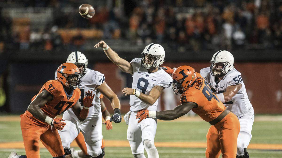 Penn State quarterback Trace McSorley (9) throws the ball in heavy traffic in the second half of a college football game between Illinois and Penn State, Friday, Sept. 21, 2018, in Champaign, Ill. (AP Photo/Holly Hart)