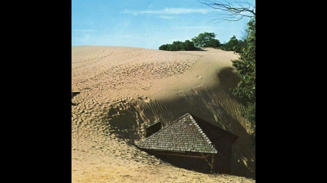 This photo is among the last taken of the Spring House before its roof vanished completely under a sand dune in the early 1960s.