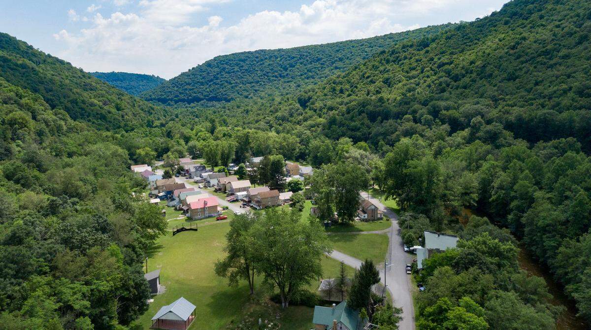 Orviston is an unincorporated community in Curtin Township nestled along Beech Creek and mountains. An aerial view of Orviston on Wednesday, July 3, 2024.