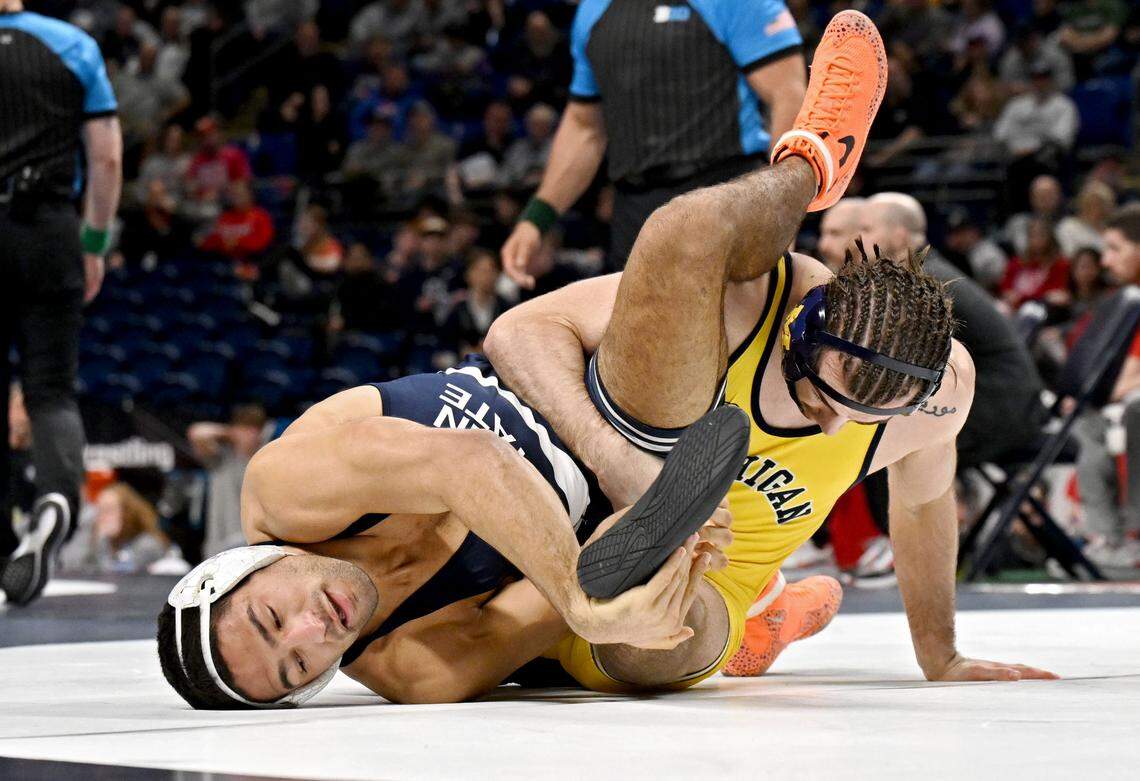 Penn State's Shayne Van Ness wrestles Michigan’s Lachlan McNeil in the 149-pound semifinal bout at the Big Ten wrestling championships on Saturday, March 7, 2026 at the Bryce Jordan Center.