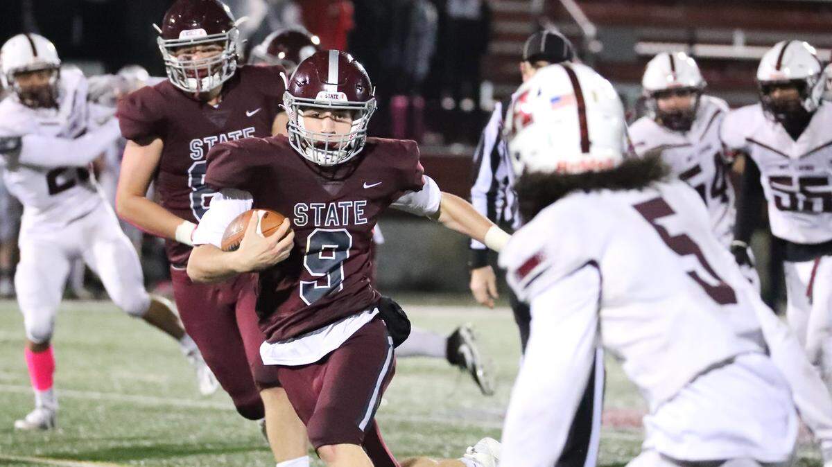 State College’s Owen Yerka runs with the ball against Altoona on Friday, Oct. 29, 2021, at Memorial Field. State College won, 21-7.
