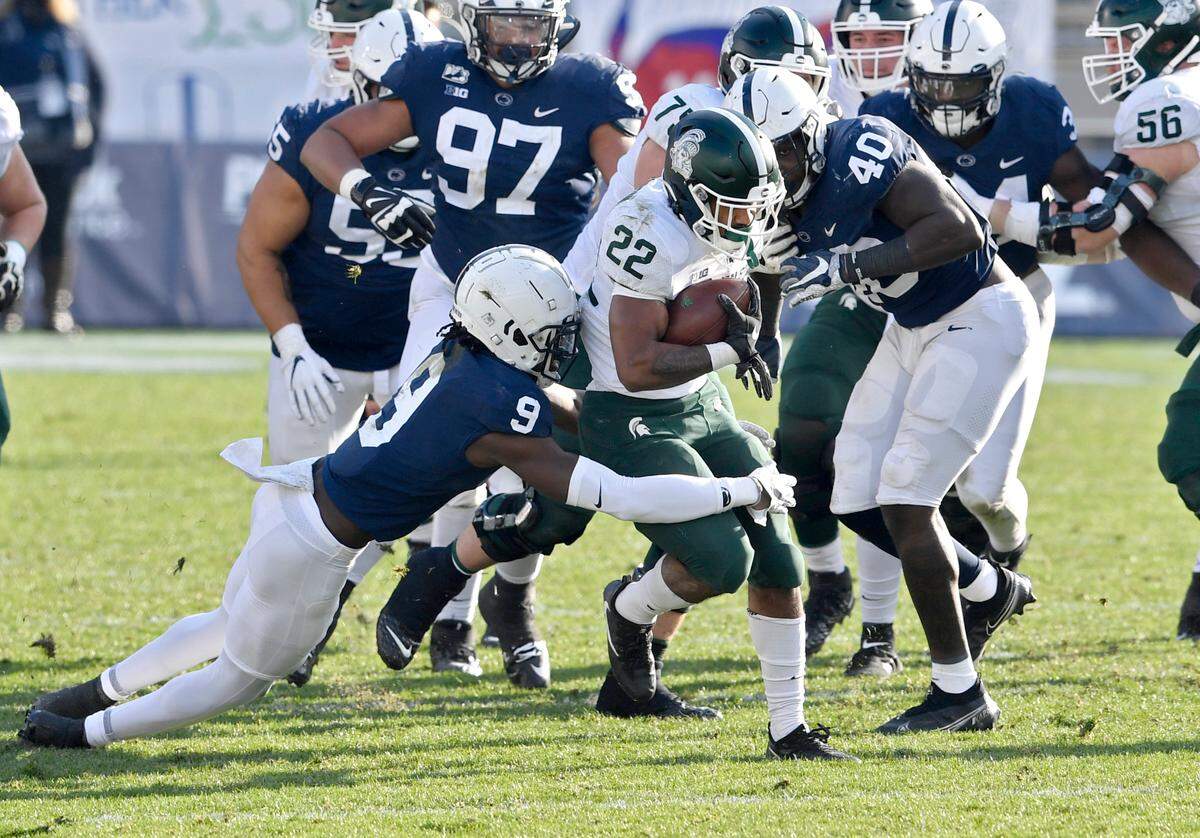 Penn State cornerback Joey Porter Jr. stops Michigan State running back Jordon Simmons during the game on Saturday, Dec. 12, 2020 at Beaver Stadium.
