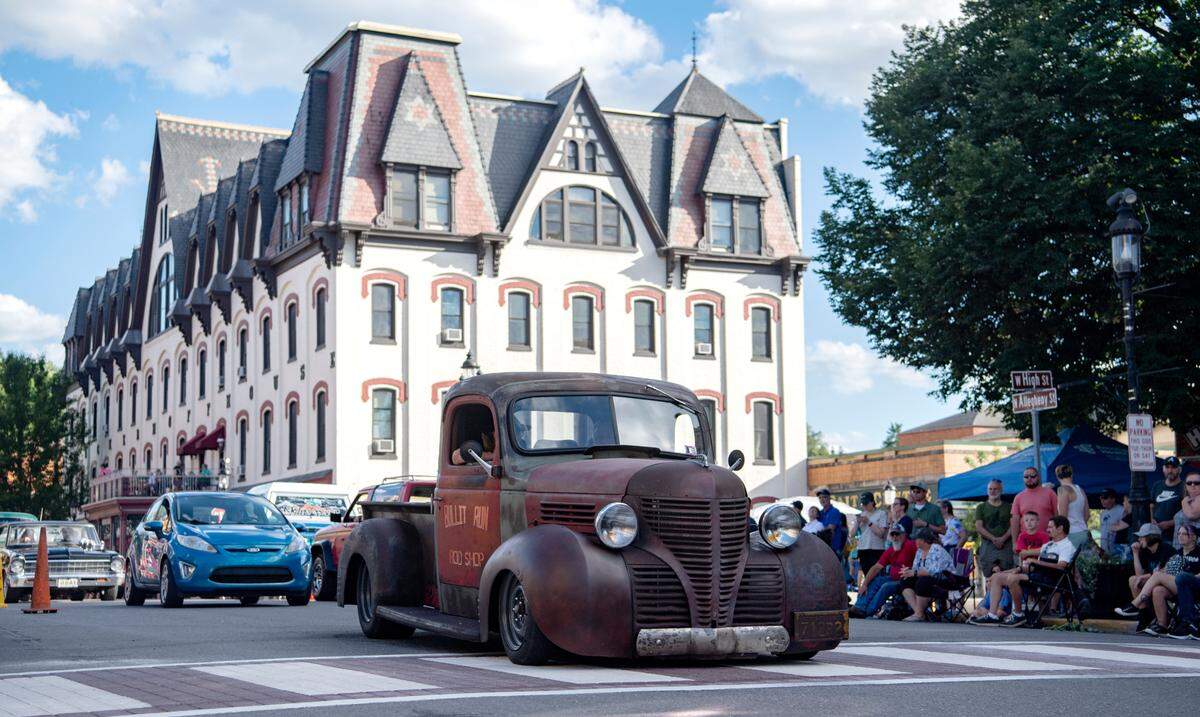 Cars cruise Allegheny street for the Bellefonte Cruise on Friday, June 17, 2022.