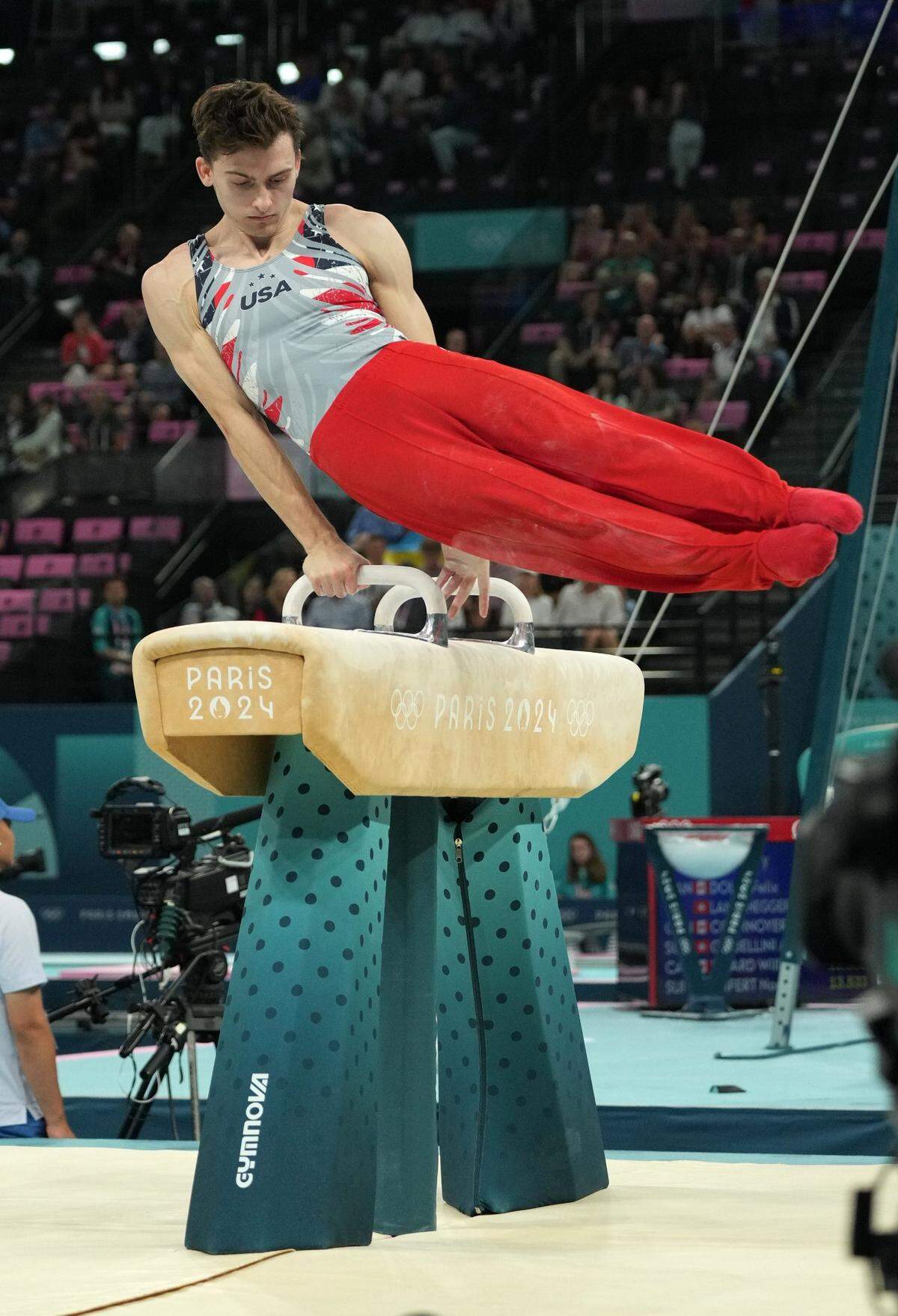 Jul 29, 2024; Paris, France; Stephen Nedoroscik performs on the pommel horse during the men's team final during the Paris 2024 Olympic Summer Games at Bercy Arena. Mandatory Credit: James Lang-USA TODAY Sports