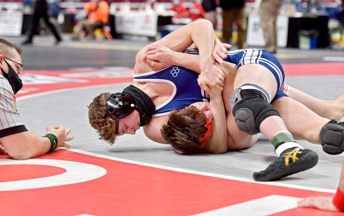Penns Valley’s Malachi DuVall controls Frazier’s Rune Lawrence in the 172 lb championship bout at the PIAA AA wrestling championships on Friday, March 12, 2021 at the Hershey Giant Center.