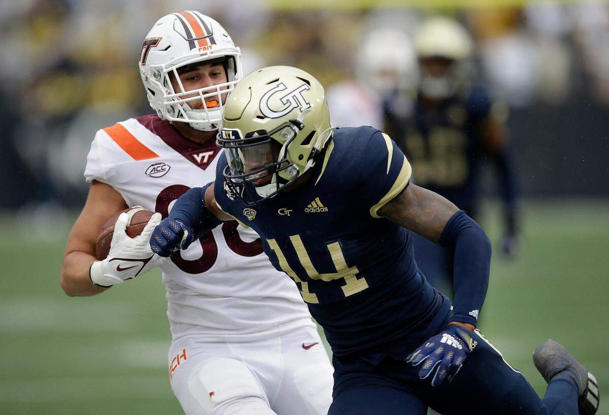 Virginia Tech’s Nick Gallo, left, tries to avoid Georgia Tech’s Jaylon King (14) during the second half of a game Oct. 30, 2021, in Atlanta. Gallo is from Richboro and went to Council Rock South.