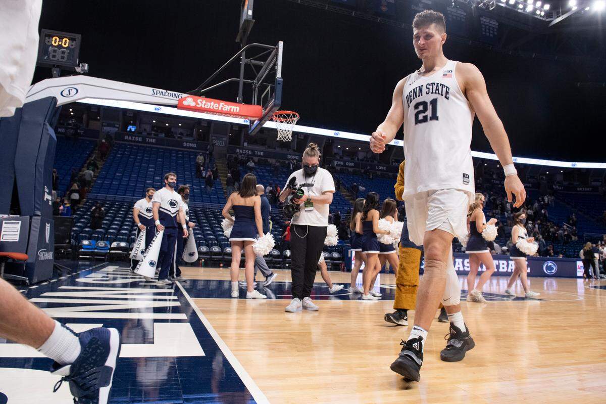 Penn State forward John Harrar (21) walks off the court after an NCAA Basketball game between Penn State and Nebraska at the Bryce Jordan Center on Sunday, Feb. 27, 2022 in University Park, Pa.