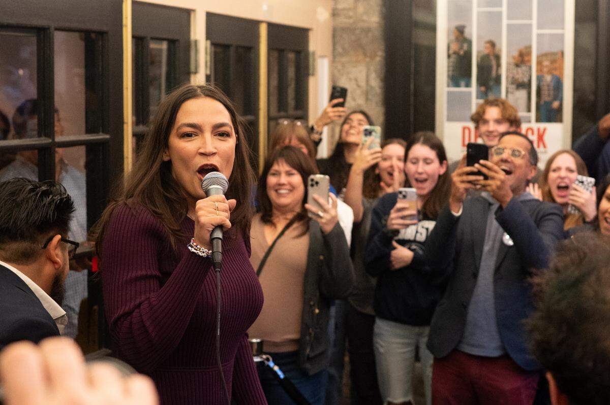 Congresswoman Alexandria Ocasio-Cortez speaks to supporters during a rally outside the State Theatre on Friday, Oct. 18, 2024.