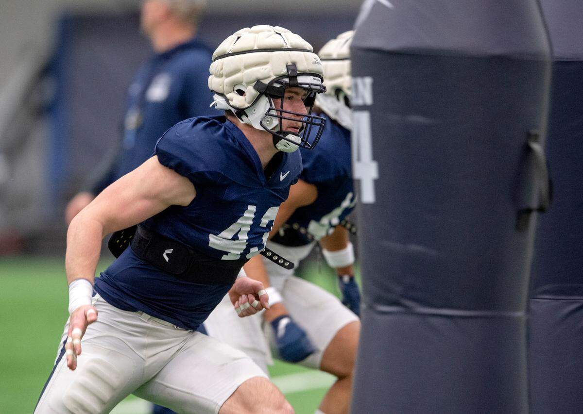 Penn State linebacker Tyler Elsdon runs a drill during practice on Friday, Dec. 17, 2021.