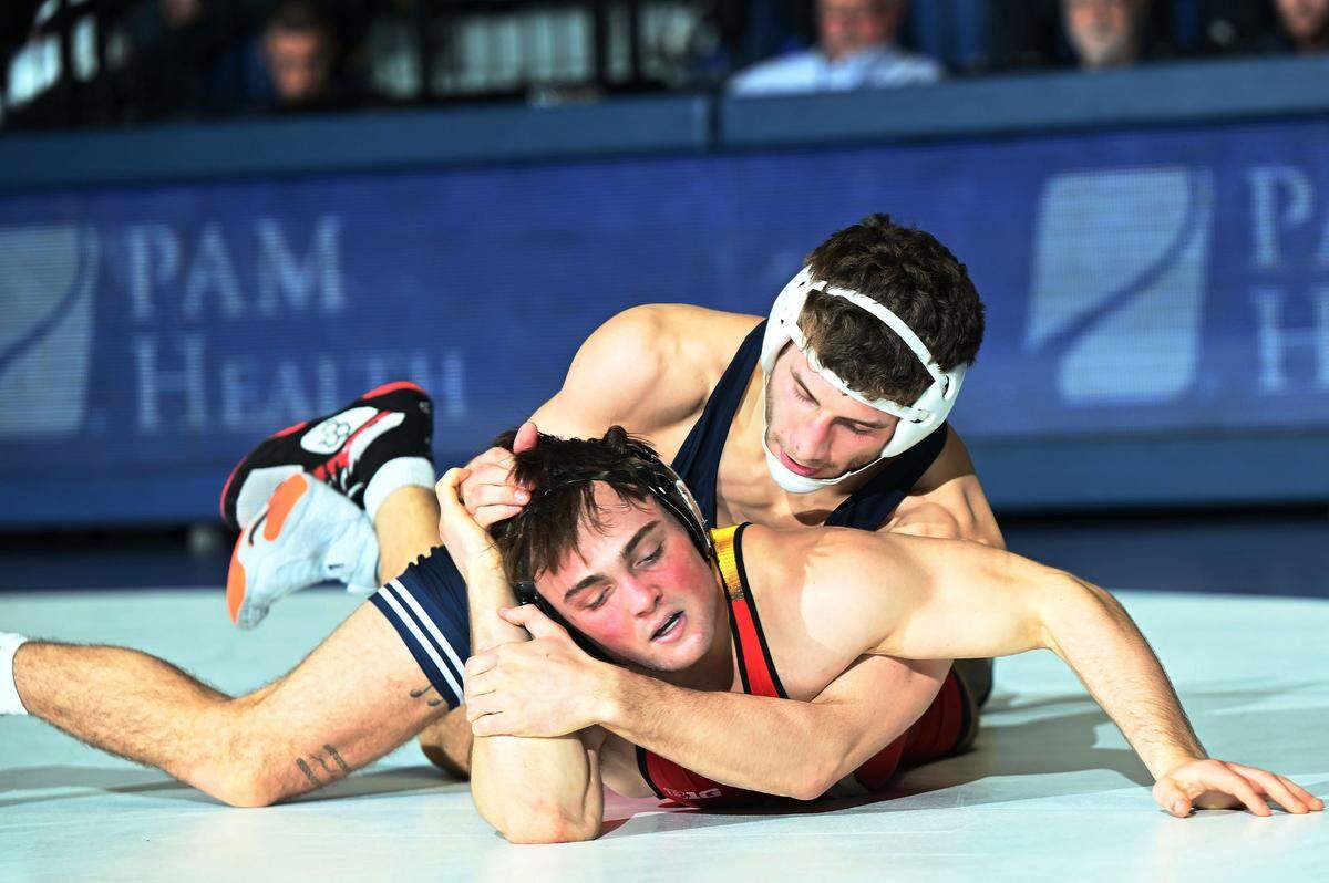Penn State’s Mitchell Mesenbrink rides Maryland’s Alex Uryniak at 165 lbs. during the Feb. 9 meeting at Rec. Hall in State College. Mesenbrink defeated Uryniak, 17-3.