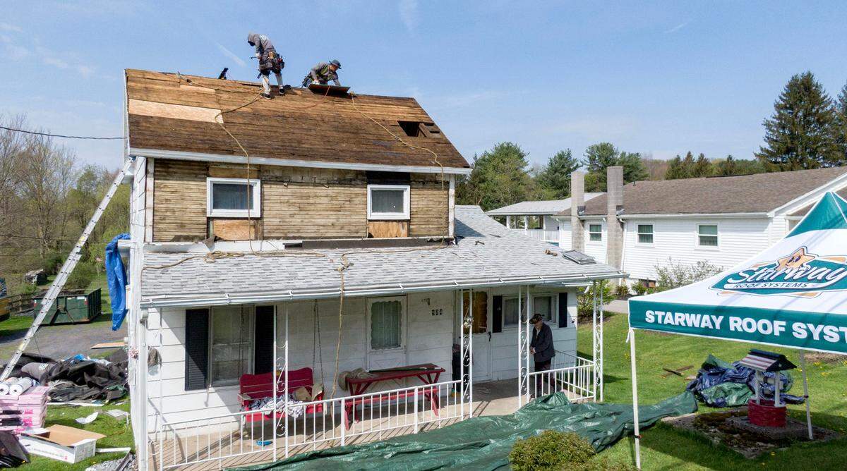 Starway Roof Systems puts a new roof on the home of Vietnam War veteran Gilbert Biggans thanks to Owens Corning Roof Deployment Project on Thursday, May 1, 2025.