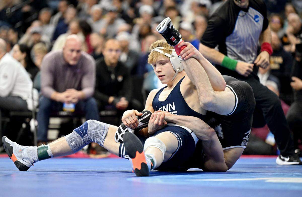 Penn State’s Braeden Davis pins Virginia Tech’s Connor McGonagle in the 133-pound bout 5th place match at the 2025 NCAA Wrestling Championships in Philadelphia’s Wells Fargo Center on Saturday, March 22, 2025.  