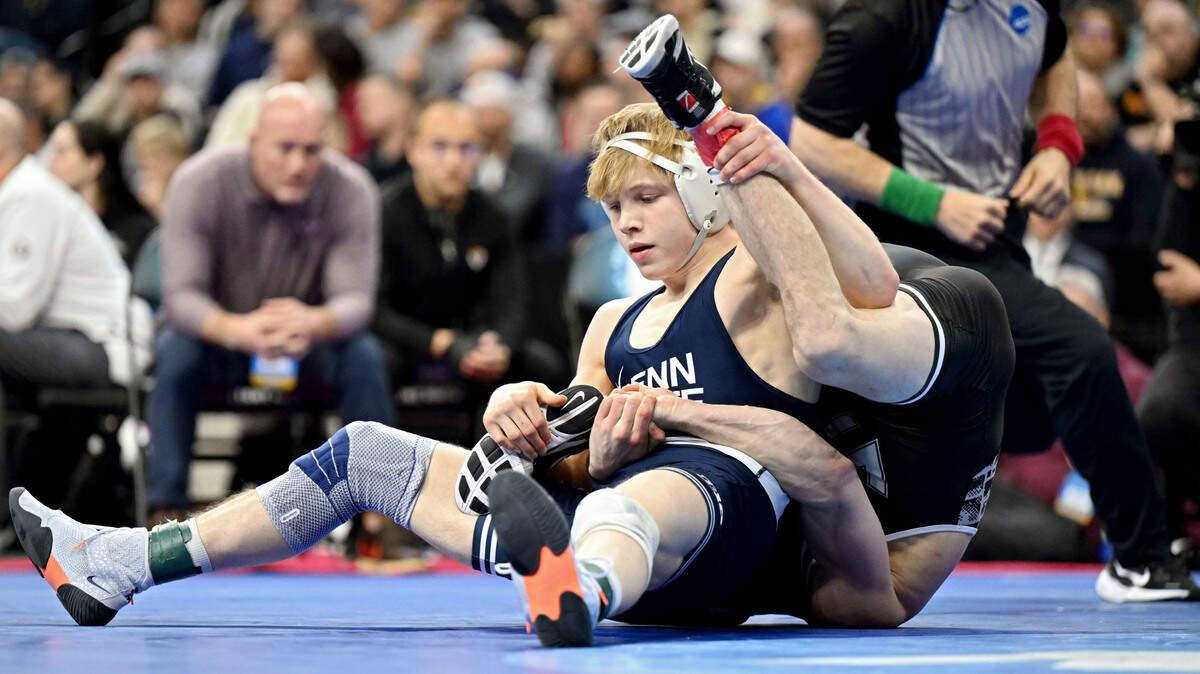 Penn State’s Braeden Davis pins Virginia Tech’s Connor McGonagle in the 133-pound bout 5th place match at the 2025 NCAA Wrestling Championships in Philadelphia’s Wells Fargo Center on Saturday, March 22, 2025.
