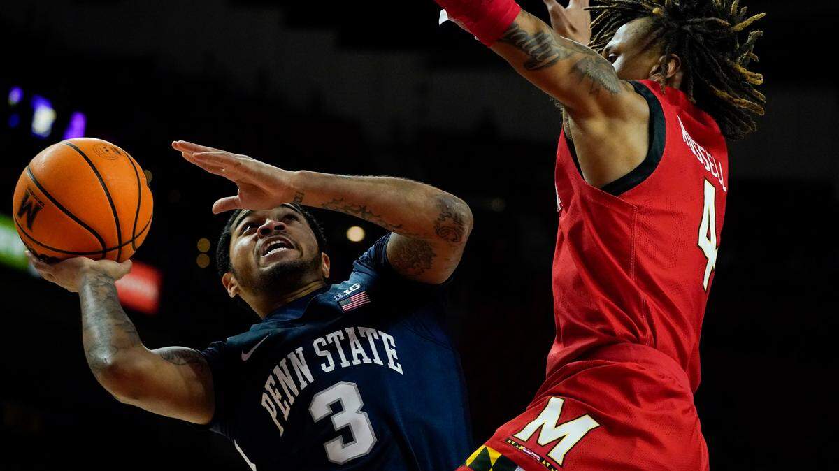 Penn State guard Sam Sessoms (3) goes up for a shot against Maryland guard Fatts Russell (4) during the first half of Monday’s game in College Park, Maryland.