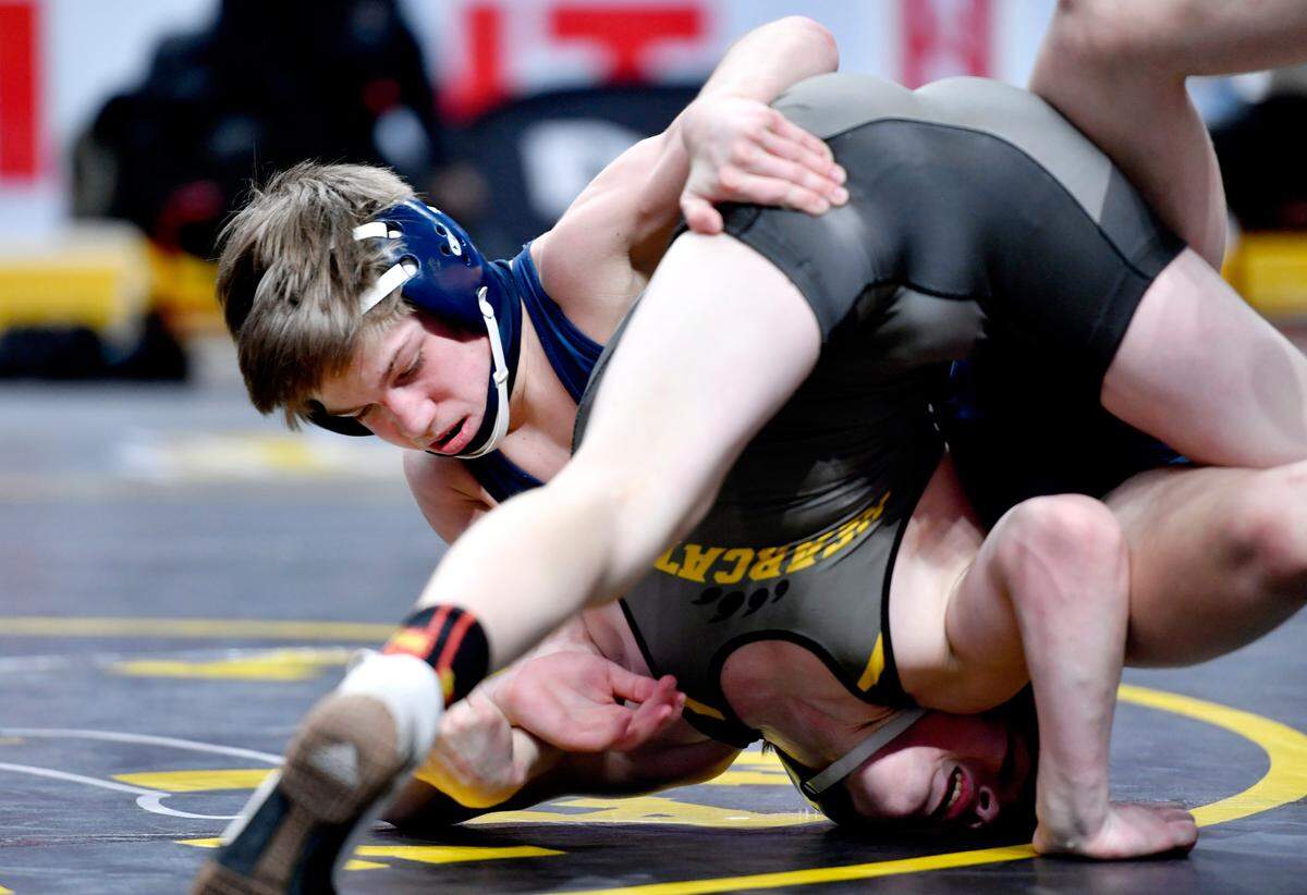 Bald Eagle Area’s Coen Bainey wrestles Bentworth’s Chris Vargo in the 113 lb third place bout at the PIAA AA wrestling championships on Friday, March 12, 2021 at the Hershey Giant Center. Bainey finished 4th.