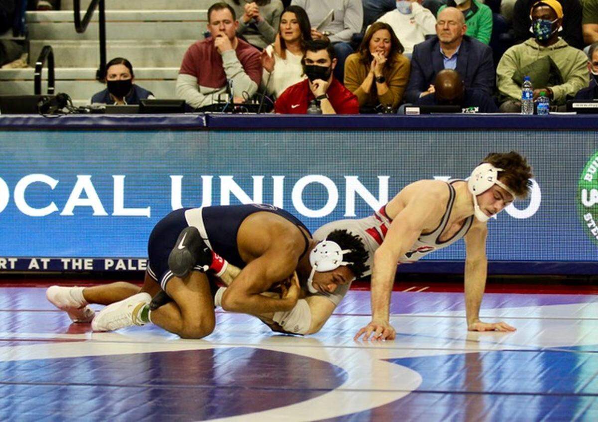 Penn State’s Carter Starocci controls Penn’s Nick Incontrera during their 174-pound bout during the Nittany Lions’ 20-16 victory on Friday. Starocci was one of only two Penn State wrestlers to secure bonus points in his 13-3 major decision.