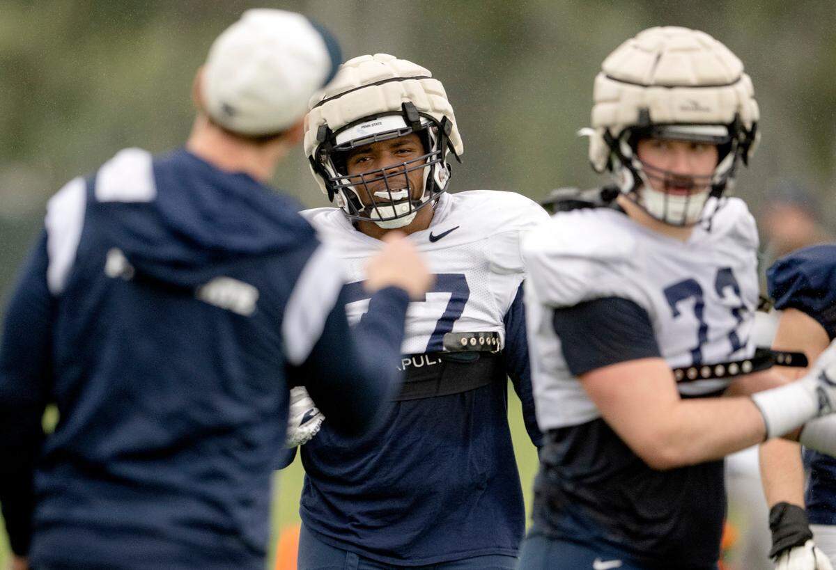 Penn State offensive lineman Sal Wormley listens to offensive line coach Phil Trautwein during practice for the Rose Bowl on Friday, Dec. 30, 2022 at Dignity Health Sports Park.